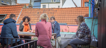 VLAIO collega's zitten rond een tafel